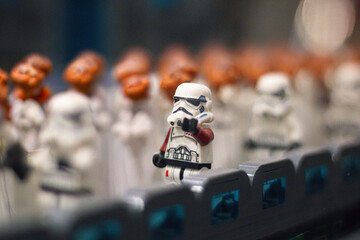 Naklejka premium Stormtrooper figurines in playful arrangement