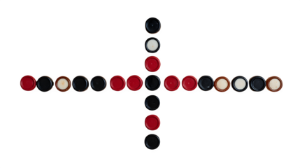 Vintage checker pieces arranged in a cross formation on a dark backdrop