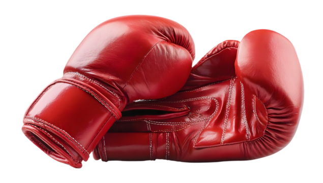 A pair of vibrant red boxing gloves, symbolizing strength and determination. Ideal for sports enthusiasts, fitness events, and motivational content.