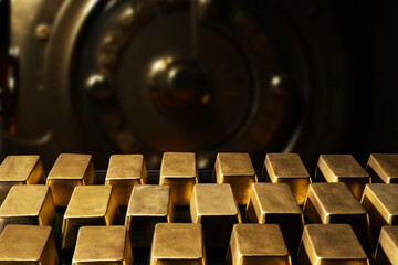 Gold bars in bank vault, national gold reserv holdings concept. Savings and investments, business...