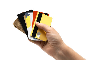 Hand holding many different plastic credit cards. The concept of bank accounts, transaction