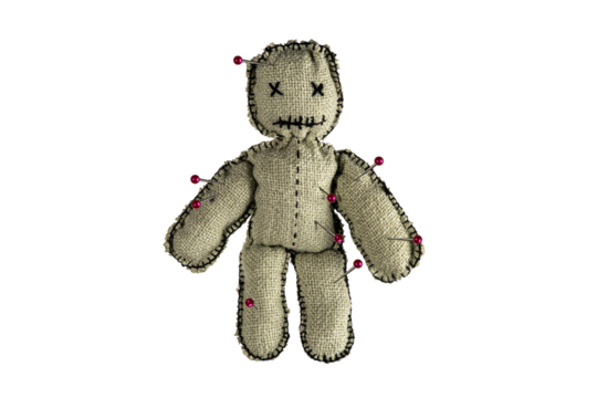 Homemade voodoo doll on isolated background. Magic toy for Halloween ritual, spells, revenge