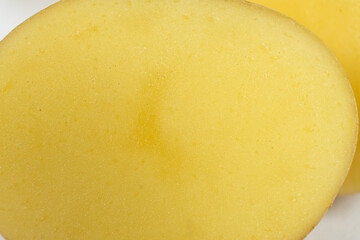 Abstract Yellow Potato Texture Macro Top View Background.