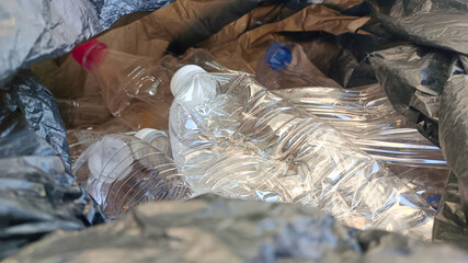 Plastic Bottles Waste in Black Bag