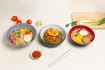 A delicious photo displaying both popular versions of Indomie: the classic fried noodles of Indomie...