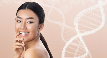 Portrait of pretty asian woman looking at white DNA chains over beige background, secret of asian...