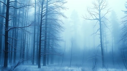 Fototapeta premium A serene winter forest landscape with misty blue tones, evoking a peaceful and dreamy atmosphere.