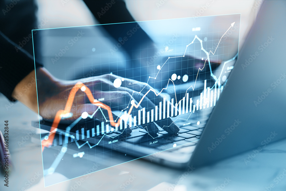 Poster businessperson analyzing financial market data with virtual hologram charts and graphs displayed ove