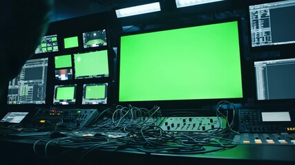 Advanced Media Control Room with Large Green Screen Monitor for Virtual Production and Broadcast Operations