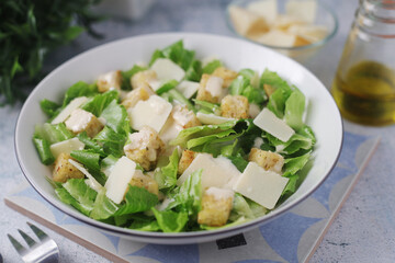 A bowl with classic Caesar salad