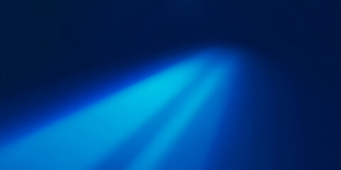 Blue light beam on dark blue background with abstract glow effect. Modern overlay for creative projects and digital art.