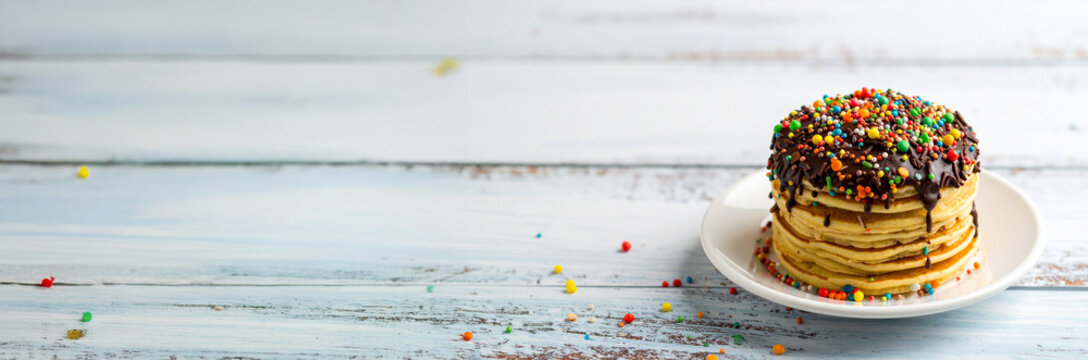 Kue Cubit Miniature Indonesian Pancakes with Chocolate Sprinkles. Traditional Indonesian Dessert