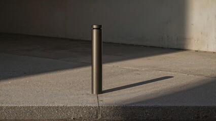Modern urban bollard furniture featuring grey tones and durable materials