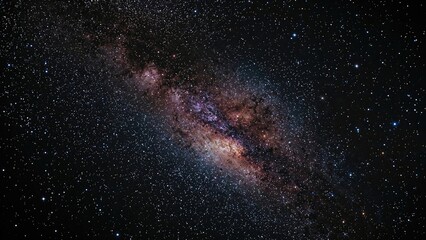 Twinkling lights within a night sky filled with galaxies