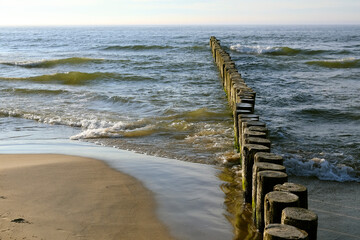 Old wooden breakwaters on the Baltic Sea coast, Ustronie Morskie, Poland