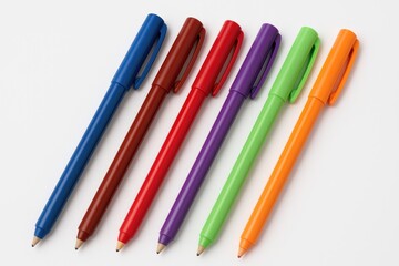 Fototapeta premium Collection of vibrant ink pens set against a white surface