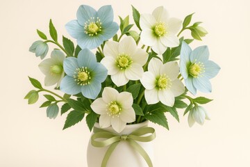 Fototapeta premium Macro image of colorful hellebore flowers in a white vase during spring