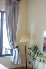 Modern lamp decor in hotel room and window, home decor,Interior design of dining room or living...