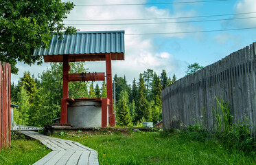 rustic redwood well in