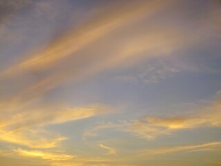 The colors of the morning blend in a harmony of gold and blue.