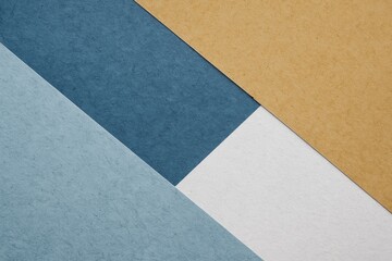 Colorful paper arrangements on sloped surfaces in abstract design