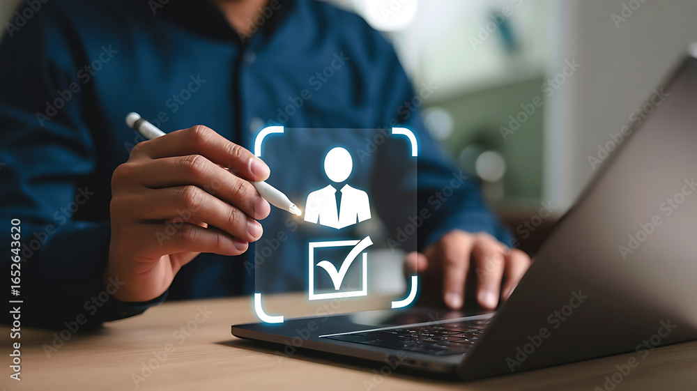 Fototapete person using a stylus to select a user profile with a checkmark on a digital interface