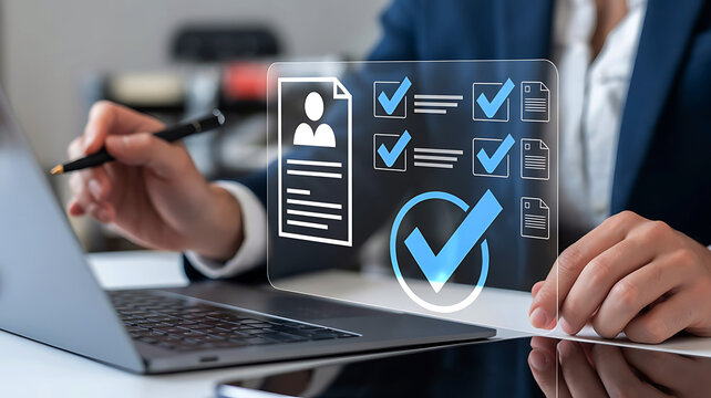 Person reviewing a digital checklist and resume on a transparent screen with a laptop and pen
