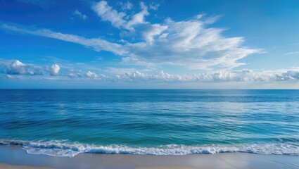 Dawn overlooking the blue sky and tranquil sea