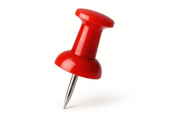 Close-up of a pushpin against a solid backdrop