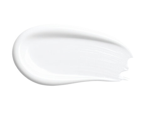 A smooth glossy white cosmetic cream smear showing a curved shape and visible application texture.