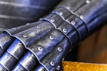 Plate glove of ancient knight's armor, consisting of several segments.. Plate glove has scratches...