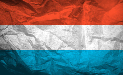 Colorful texture of Luxembourg flag displayed on crumpled paper