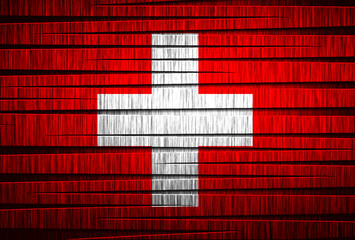 Switzerland's flag displayed in an artistic wooden design
