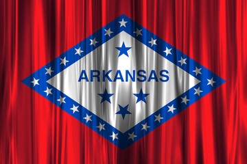 Arkansas state flag illuminated against elegant red drapes