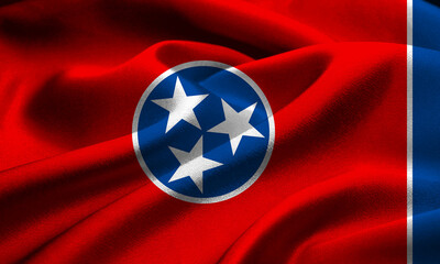 Colorful fabric waves of the Tennessee state flag captured in sunlight