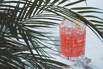 Savory margarita alcoholic cocktail drink with tequila, paprika, pepper juice, lime juice, syrup...
