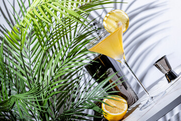 Breakfast Martini alcoholic cocktail drink with gin, orange liqueur, lemon juice, marmalade, lemon...
