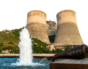 Two weathered concrete cooling towers in a mountain landscape with a gushing water fountain.