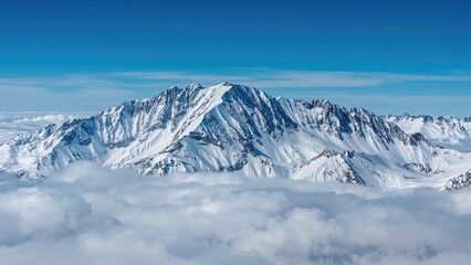 Obraz premium Clouds Hovering Over Snowy High Elevations