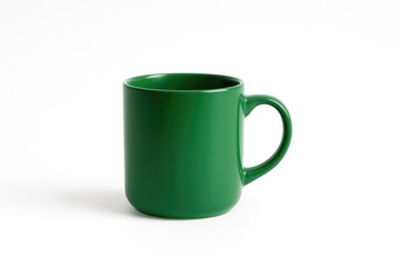 Green ceramic mug standing alone on plain white surface