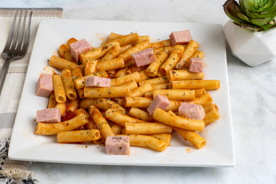 ziti  top with  spam and herbs