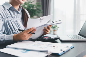 Business woman analyze calculate company financial, tax results office accounting statistics...