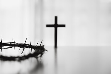 Cross and crown of thorns, often seen in gold crucifix symbols, represent the sacrifice of Jesus Christ-central to Easter message and the foundation of faith in the Christian religion.