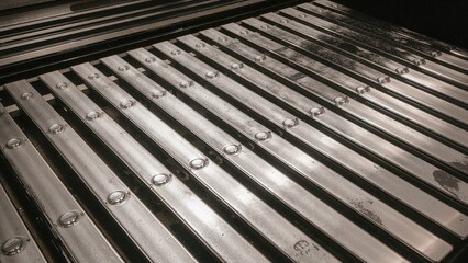 Resembling a xylophone, this percussion instrument features metal bars arranged in a pattern akin to piano keys, known as orchestra bells.