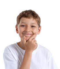 Thoughtful young boy smiling with hand on chin in closeup pose,