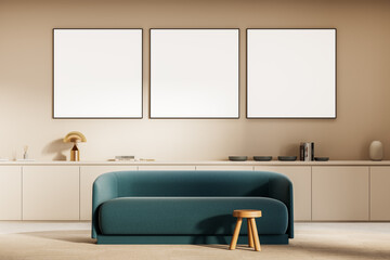 Fototapeta na wymiar Framed blank posters on beige wall above modern teal sofa in minimal living room interior with wooden decor and soft neutral lighting ambiance concept. 3D Rendering