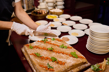 An Elegant Feast Featuring a Beautiful and Traditional Cake Presentation for All