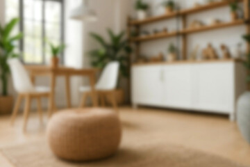 Blurred view of modern living room with sofa and soft bench. room interior with couch, armchair and coffee table or shelving units. stylish living room. comfortable workplace near big window.