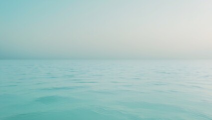Obraz premium Serene ocean horizon with soft light and gentle waves
