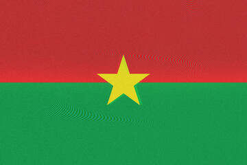 The vibrant flag of Burkina Faso presents a powerful display of national pride, showcasing its symbolic colors of red, green, and yellow, each representing the nation's spirit and hope.